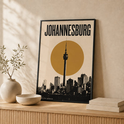 Johannesburg Skyline art print in a black frame leaning against a wall #Black